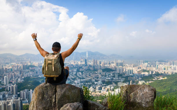 istock Man enjoying Hong Kong view from the Lion rock 1033106918