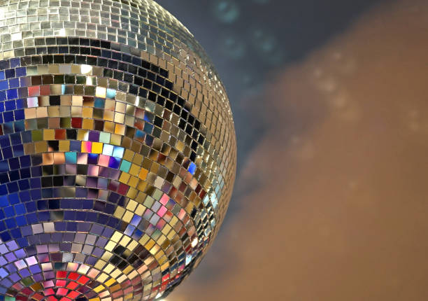 istock Shiny mirror ball with colorful highlights at the disco. 1033122988