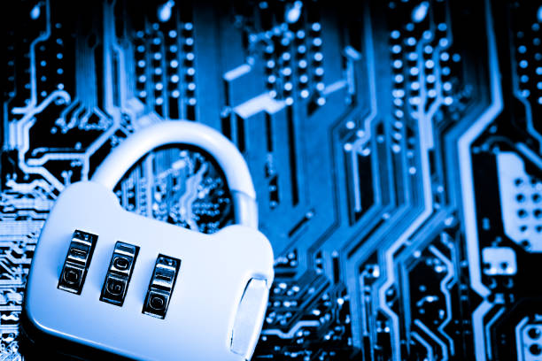 istock Abstract,close up of Lock on Mainboard Electronic computer background. (best internet top security) 1033142184