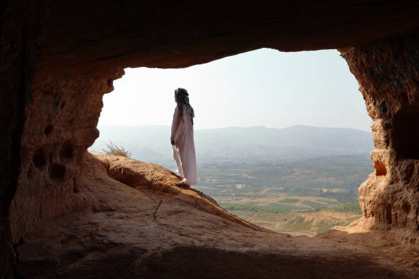 istock ARABIC MAN WITH DJELLABA AND TURBAN IN A CAVE 1033142806