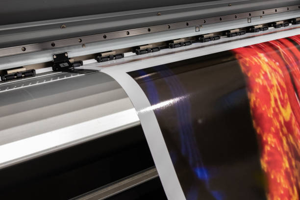 istock Big printer in professional facility during color sampling test. Indoor, industrial activity. 1033149734