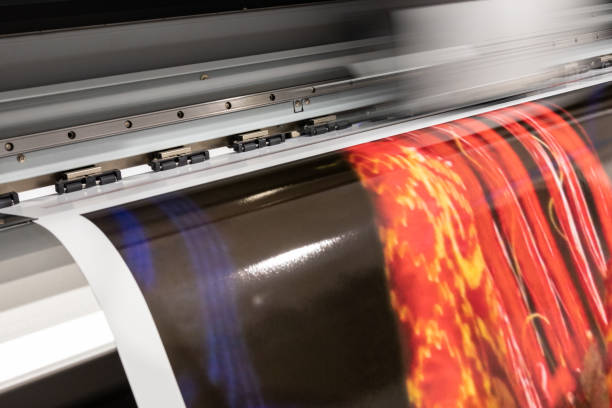 istock Big printer in professional facility during color sampling test. Indoor, industrial activity. 1033149788