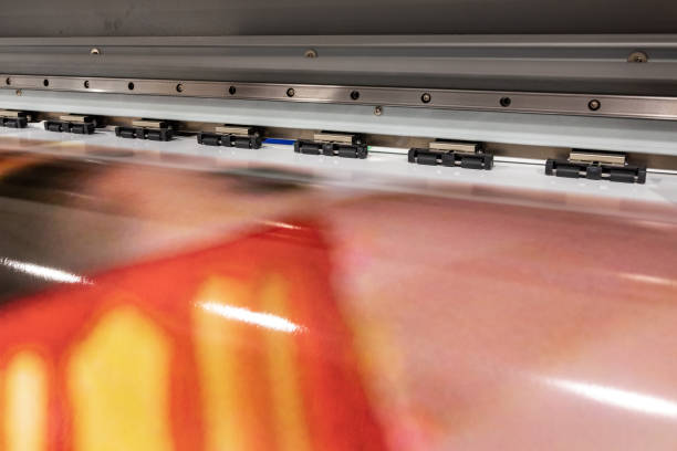istock Big printer in professional facility during color sampling test. Indoor, industrial activity. 1033149808