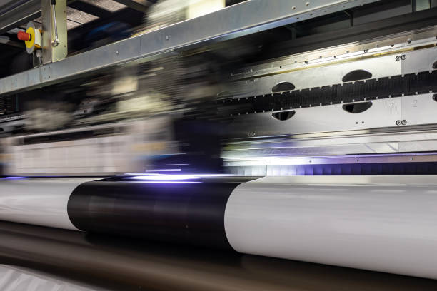 istock Massive, big, fast print head in motion, flashing by with motion blur. 1033157416