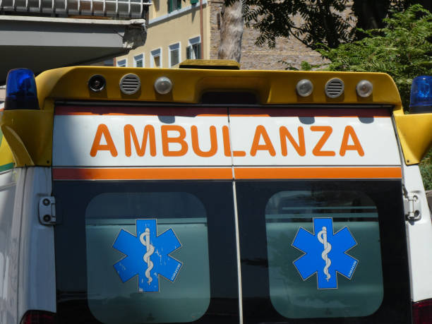 Italian ambulance Rome, Italy - July 31, 2018: Italian Emergency Mobile Unit ambulance moving on a street in Rome during the day rome italy sign symbol stock pictures, royalty-free photos & images