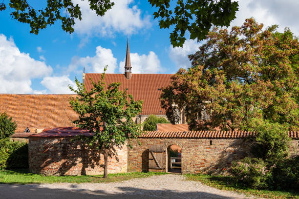 istock View to a historical building in Rostock, Germany 1033167940