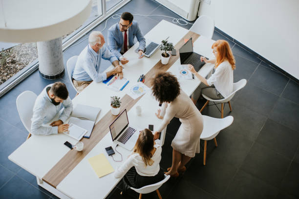 istock Top view at business people in office 1033178050