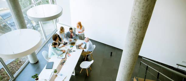 istock Top view at business people in office 1033178052