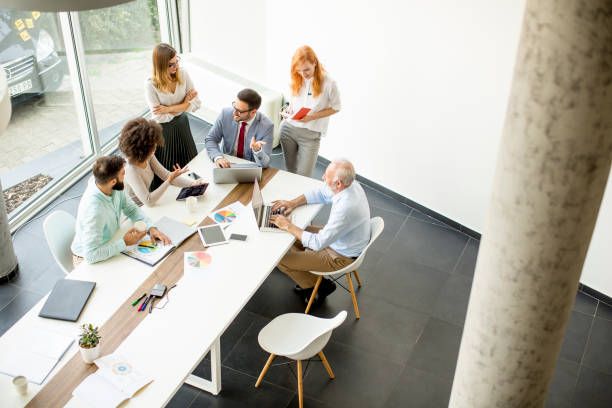 istock Top view at business people in office 1033178060