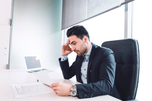 istock Reviewing the contract and plans 1033194606