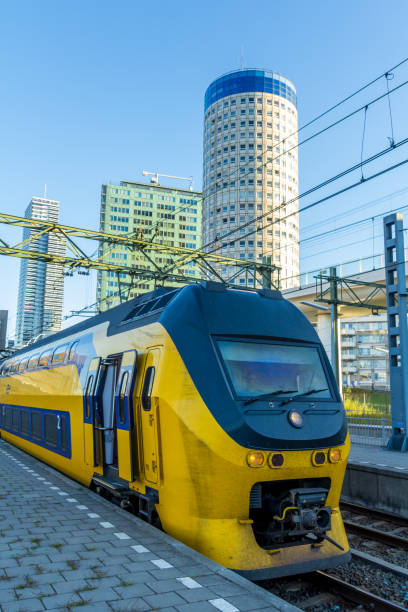 Dutch intercity train at The Hague central station The Hague central station, the Netherlands - August 20, 2016: Dutch electric intercity train at The Hague Central station tasrail stock pictures, royalty-free photos & images