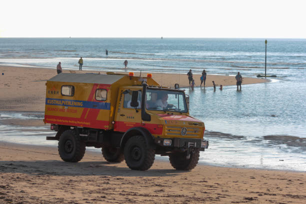 Kijkduin beach, the Netherlands - July  4, 2016: surf life saving vehicle on the beach