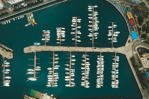 Marina bay with sailboats and yachts in Gijon.
