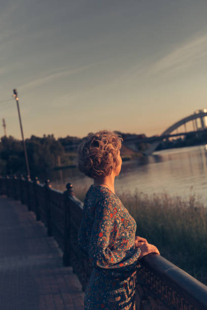 istock Woman watching the sunset 1033217048