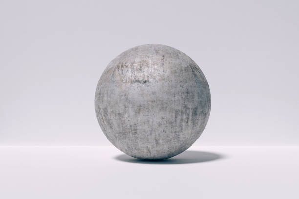 istock 3d concrete sphere against white concrete wall 1033217208