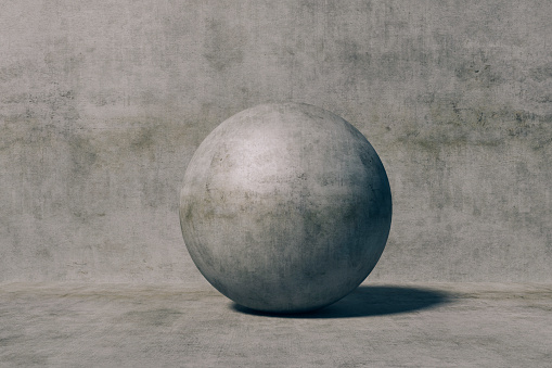 3d concrete sphere against concrete wall