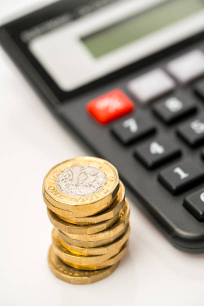 istock New one pound coin in studio, Finance concept 1033223590