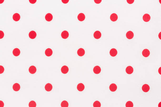 istock Textile fabric polka dot background white and red texture. 1033226214