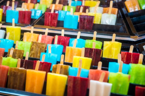 Delicious fresh colourful ice lolly on stick.