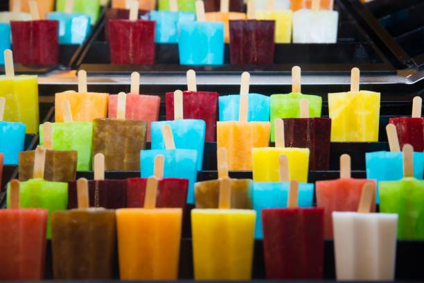 Delicious fresh colourful ice lolly on stick.