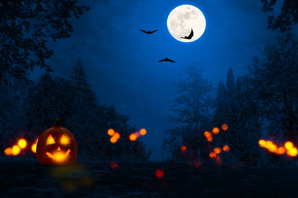 istock flying bats and jack lantern in the halloween night 1033239808