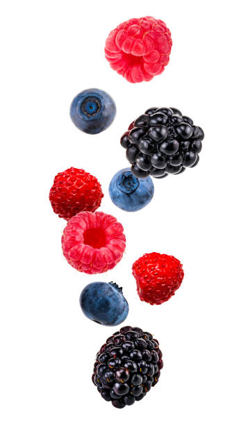 Falling berry mix isolated on a white background stock photo