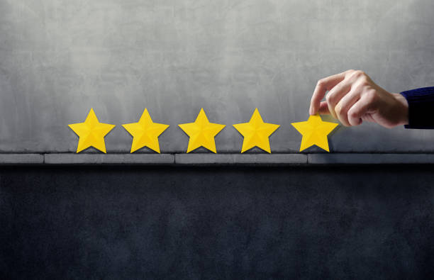 istock Customer Experience Concept. Best Excellent Services for Satisfaction present by Hand of Happy Client giving Five Star Rating 1033253578