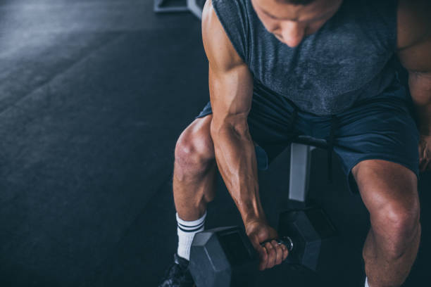 istock Sport. Unrecognizable strong athlete is going to do exercise 1033261352