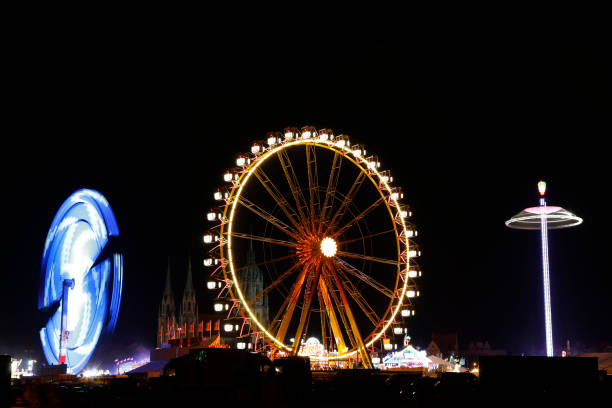 istock ferris wheel, folk festival 1033264974