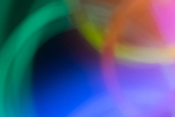istock Abstract Backgrounds Glowing Light in Rainbow of Colors 1033270196