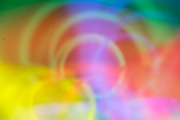 istock Abstract Backgrounds Glowing Light in Rainbow of Colors 1033270460