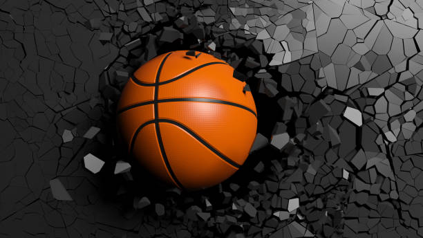 istock Basketball ball breaking forcibly through a black wall. 3d illustration. 1033270822
