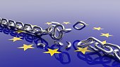 Silver chain breaking over european union flag