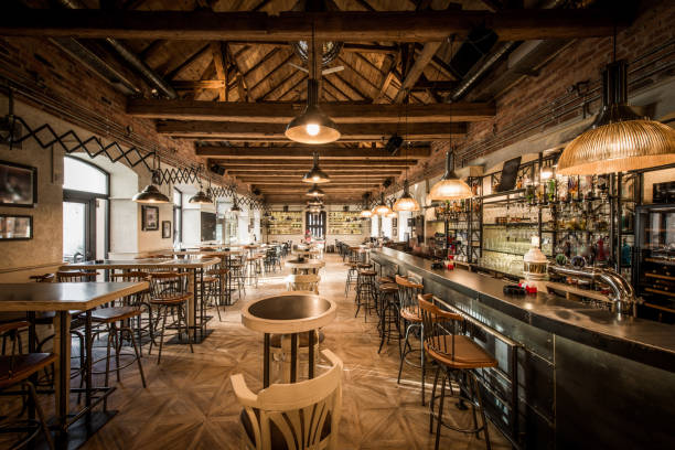istock Long bar and stools in retro caffe restaurant 1033274290