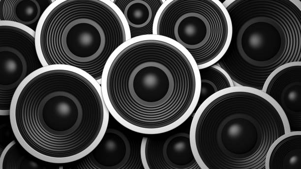 istock Multiple various size black sound speakers background. 3d illustration 1033275150