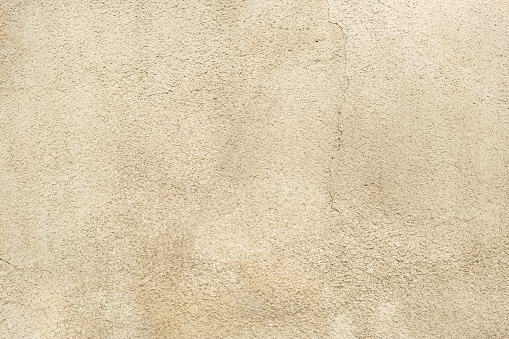 Limestone, sandstone pink wall background. Weathered, vintage, blank surface for backdrop. Close up.