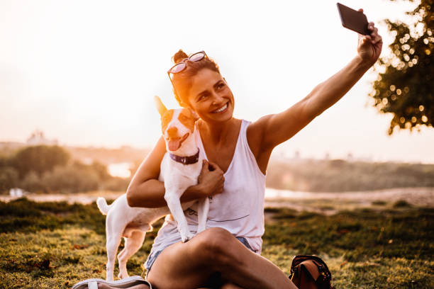 istock Selfie with dog on sunset 1033284040