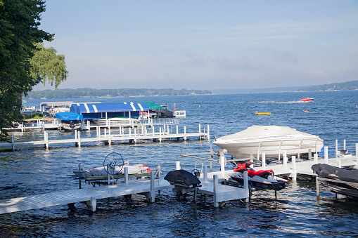 Boat docked in dock on the beautiful waters of Lake Geneva Wisconsin