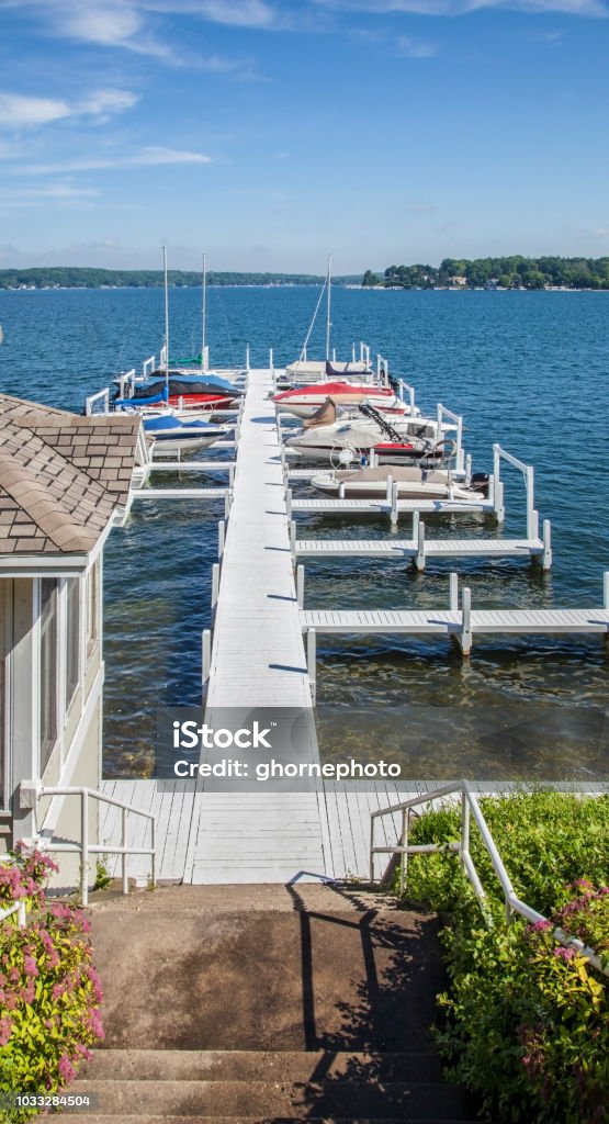 Boat dock on the beautiful waters of Lake Geneva, Wisconsin Blue Stock Photo