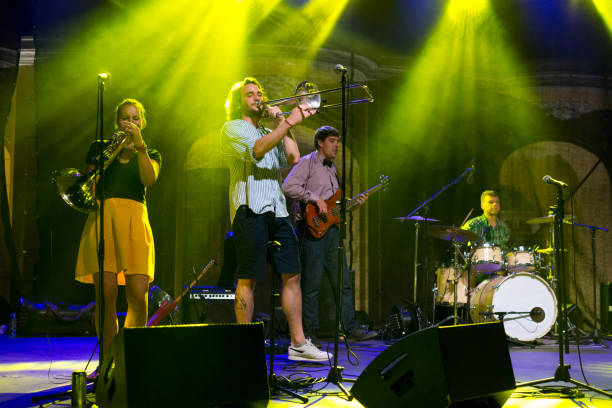 istock Rock group playing on the concert 1033295216