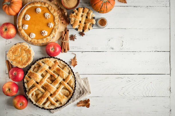 thanksgiving pumpkin and apple various pies - treated wood imagens e fotografias de stock