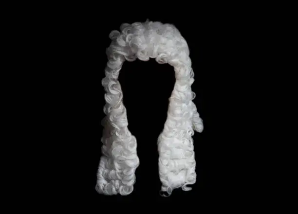 Judge white wig on a black background.