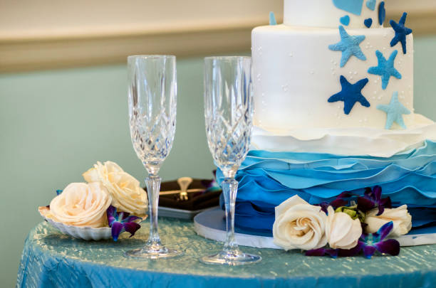 istock Flowers next to wedding cake 1033298358