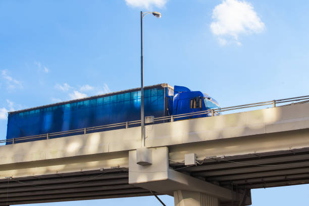 istock truck delivers freight on bridge 1033307070