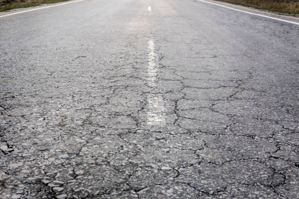 istock asphalt paving on highway 1033307260