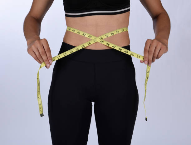 istock Beautiful young woman, studio portraits, exercising 1033307270