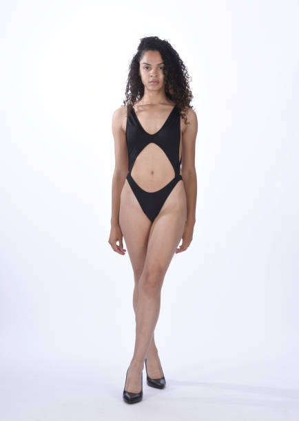 istock Beautiful young woman, studio portraits, exercising 1033307444