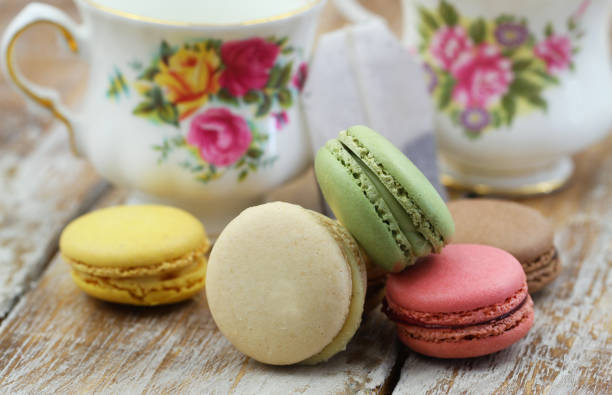 istock Stack of colorful crunchy macaroons on wooden surface 1033310424