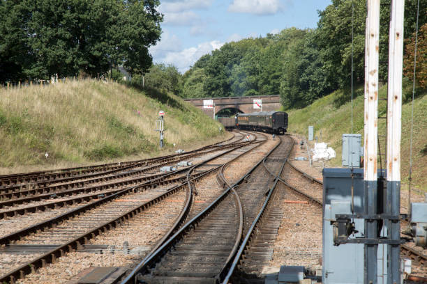 istock Steam Train leaving Station; England 1033311962