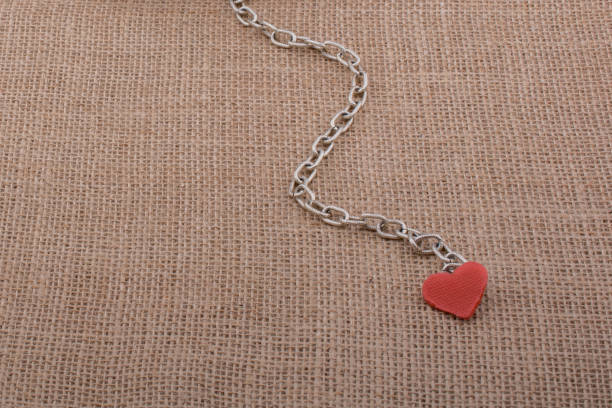 istock Little books attached to a heart with a chain 1033317866